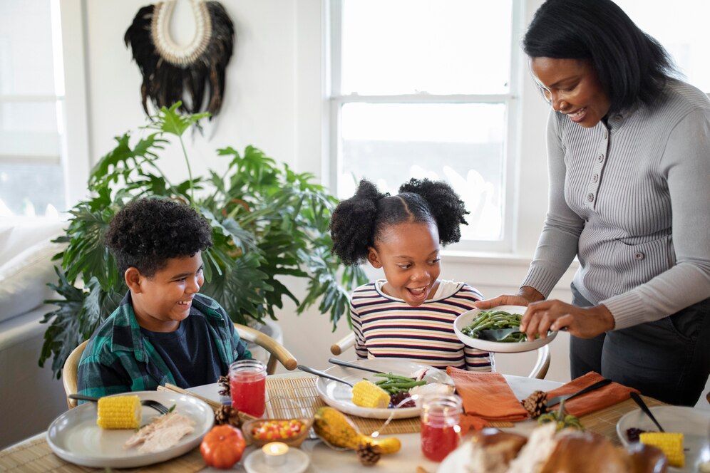 family-enjoying-thanksgiving-day-dinner_23-2149129527