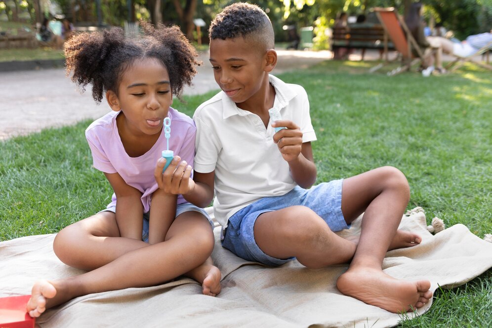 full-shot-kids-making-soap-bubbles_23-2149119420